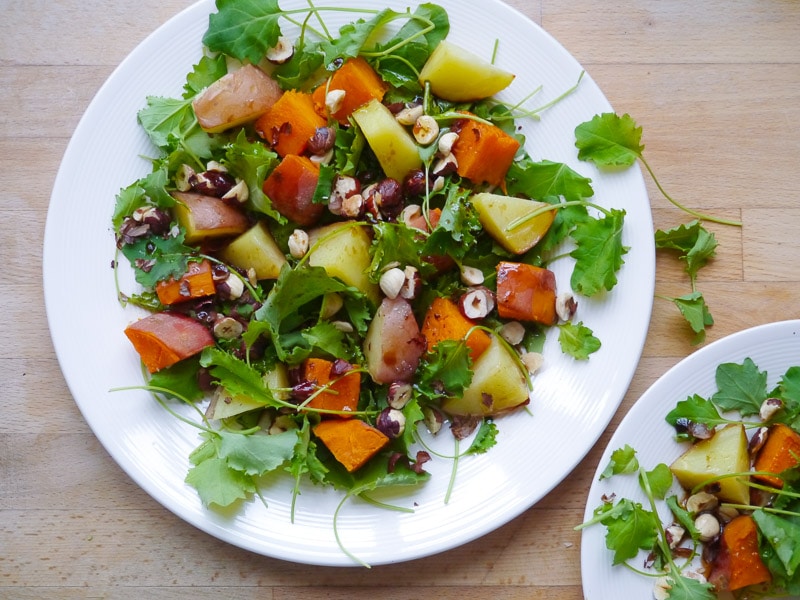 When you can't decide between potato and sweet potato, the answer is to clearly have a little bit of both. They pair perfectly with crunchy hazelnuts and a zesty, lemon-infused dressing in this recipe. When you can't decide between potato and sweet potato, the answer is to clearly have a little bit of both. They pair perfectly with crunchy hazelnuts and a zesty, lemon-infused dressing in this recipe.
